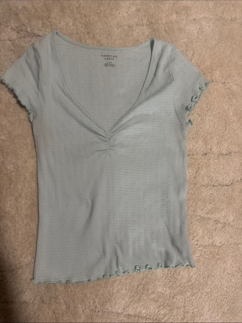 American Eagle Outfitters Pale Blue Ribbed V‑Neck Lettuce Hem Tee